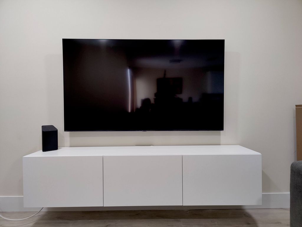 tv and tv stand mounting with behind the wall conc