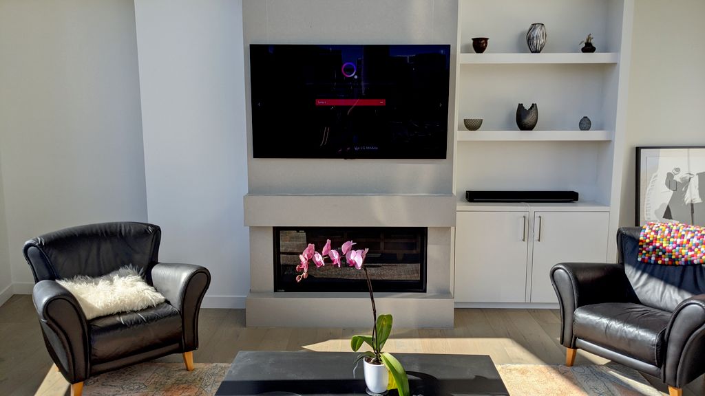 TV mounted on concrete slab in Seattle high-rise c