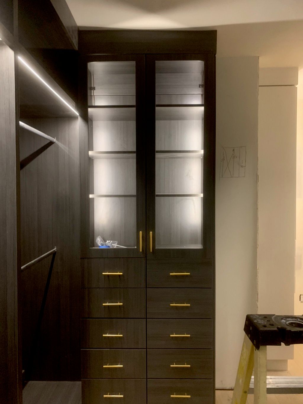 Custom walk-in closet cabinet lighting with dimmer