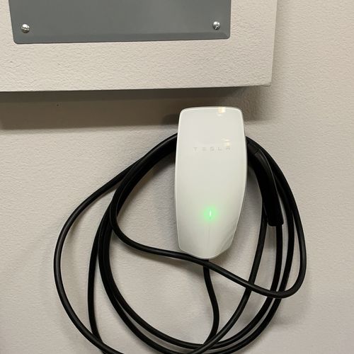 Jesus helped us install our Tesla Wall Connector. 