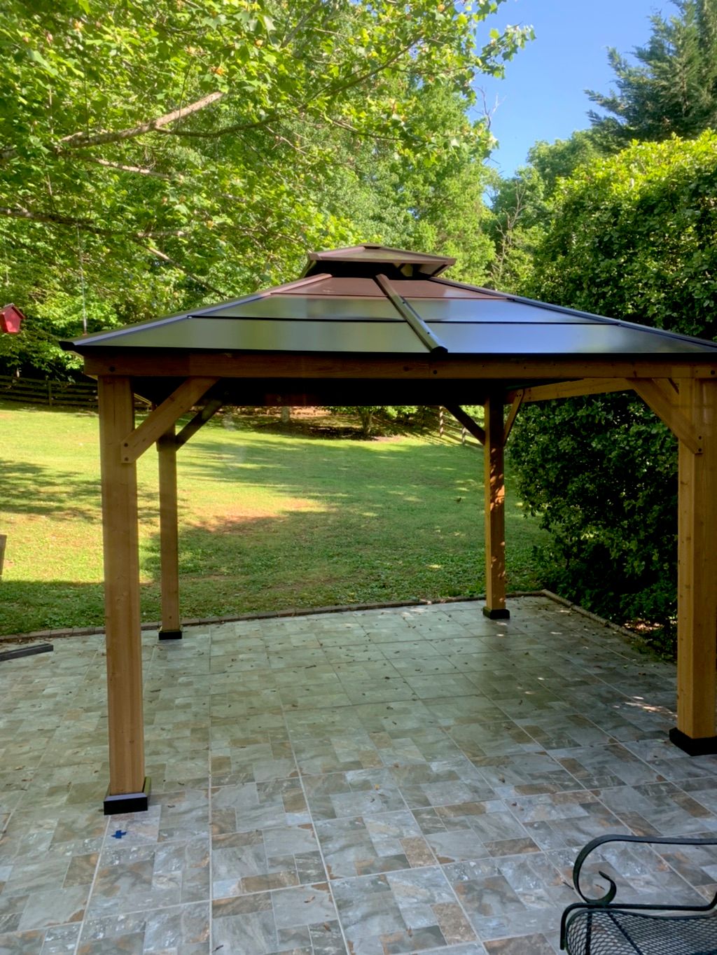 David assembled a Sunjoy gazebo on our patio. He w