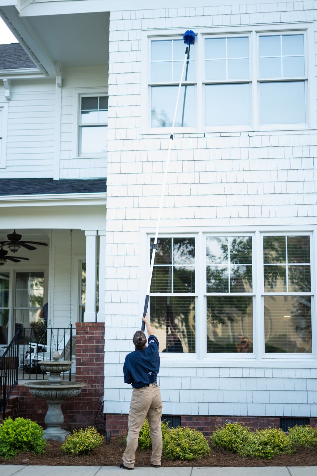 de-webbing 2nd story windows and higher!