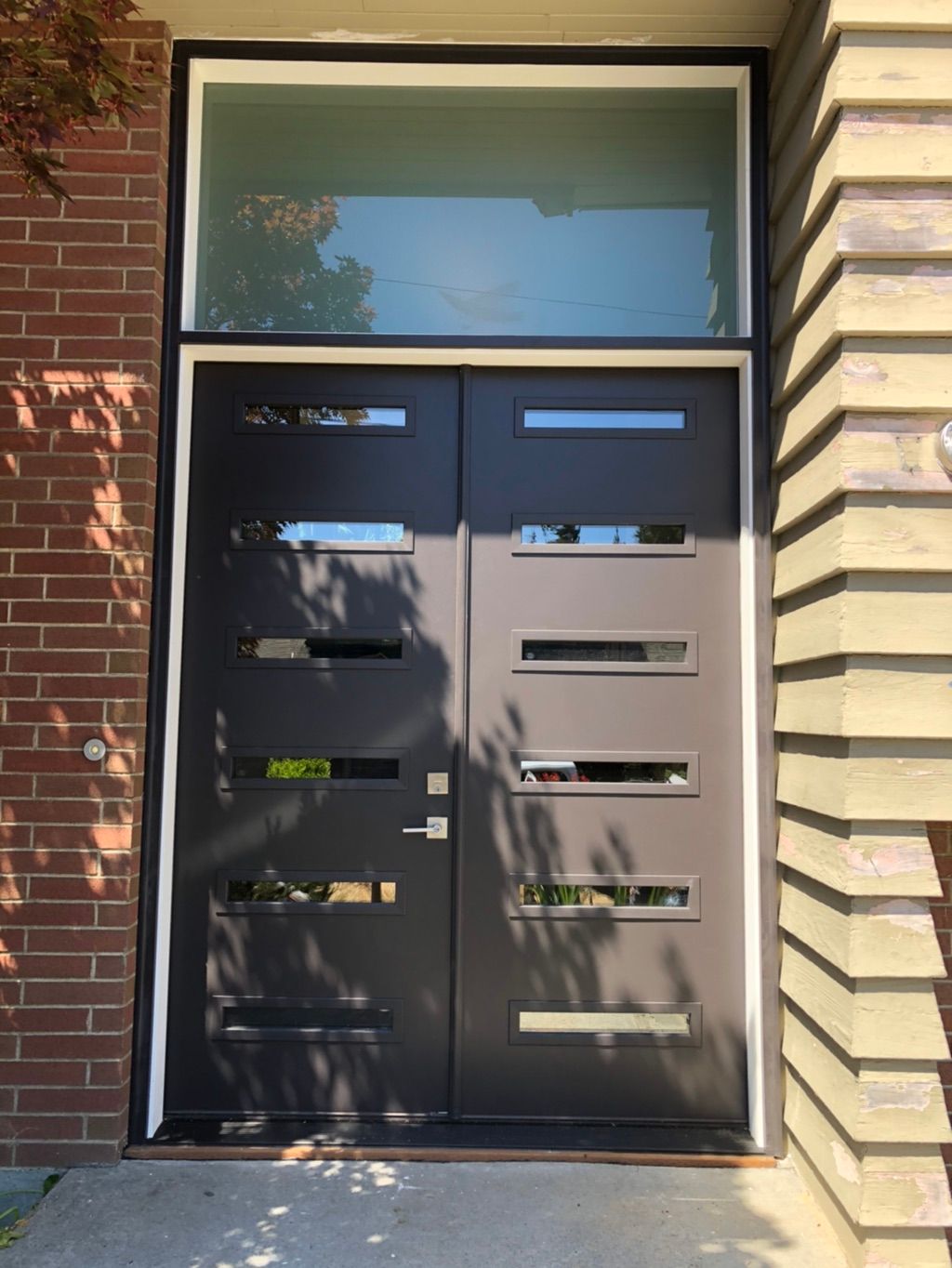 After double exterior doors and transom