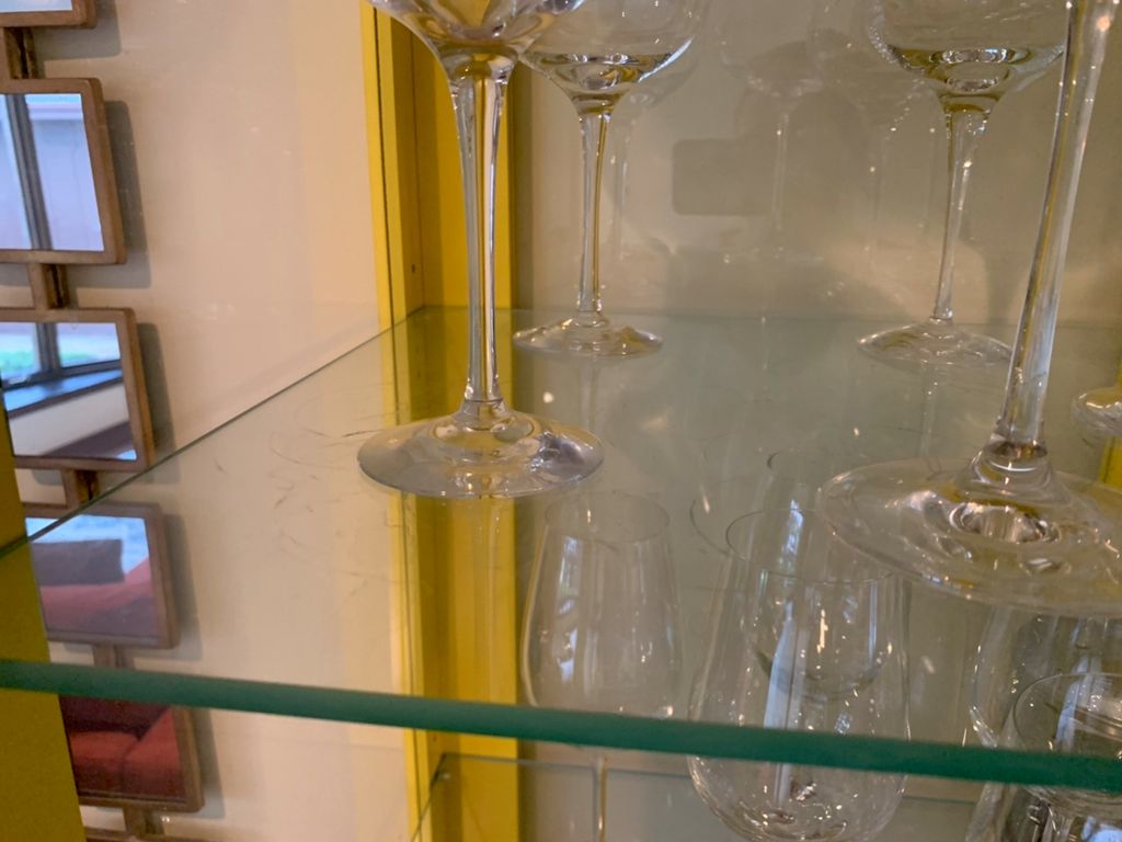Vary small details like this glass cabinet get dee