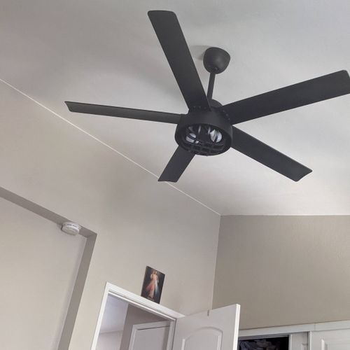 Cat did an amazing job installing a ceiling fan in