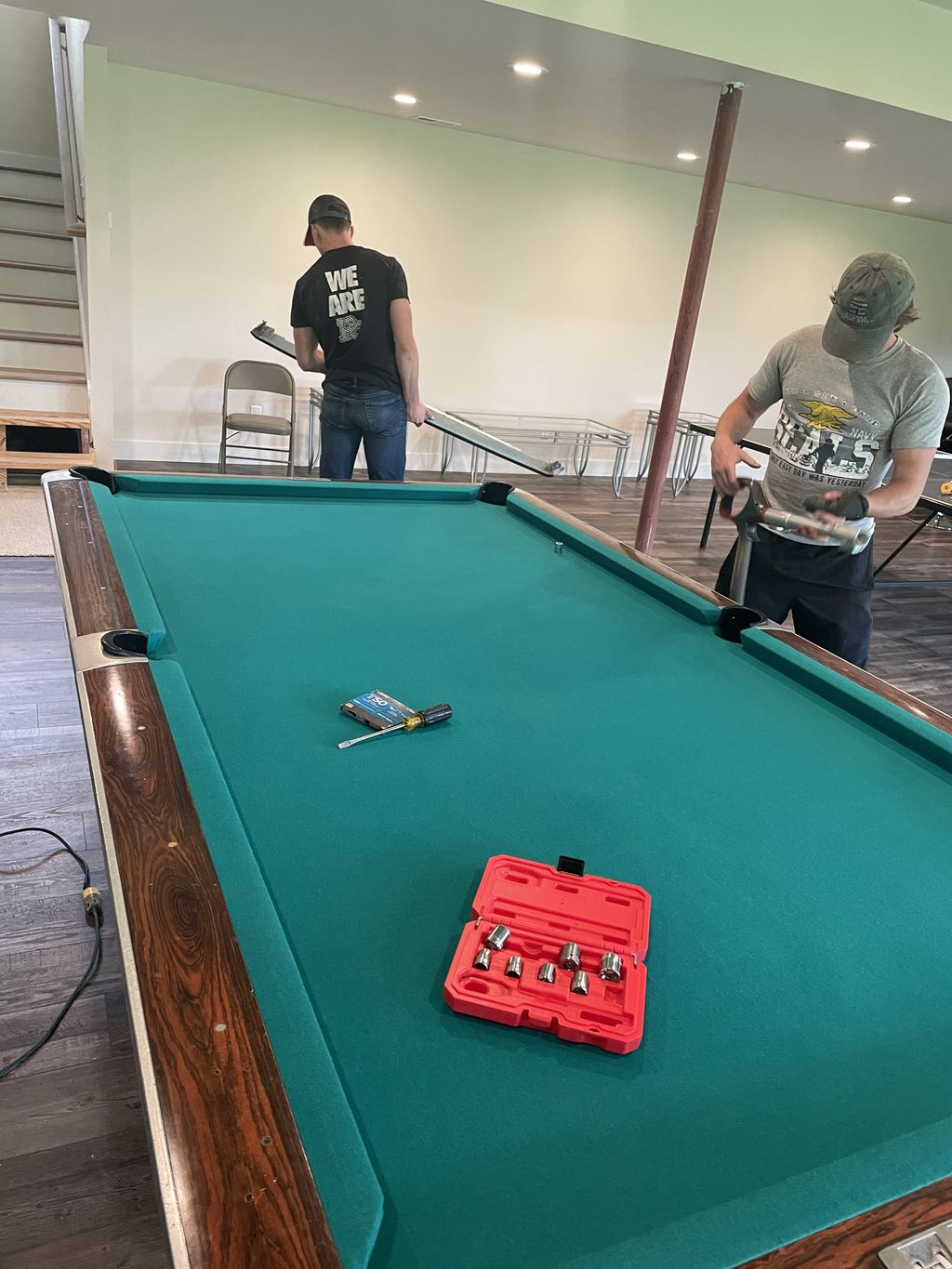 Final Assembly of pool table, perfectly level