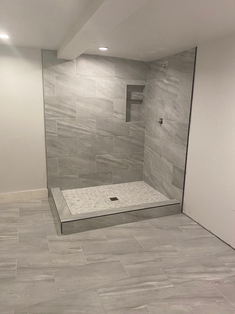 The after we tiled the floor and custom shower