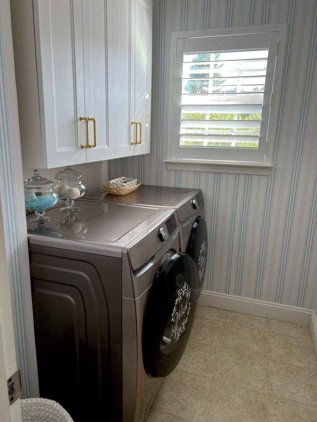 Luis installed flooring in our laundry room. He is