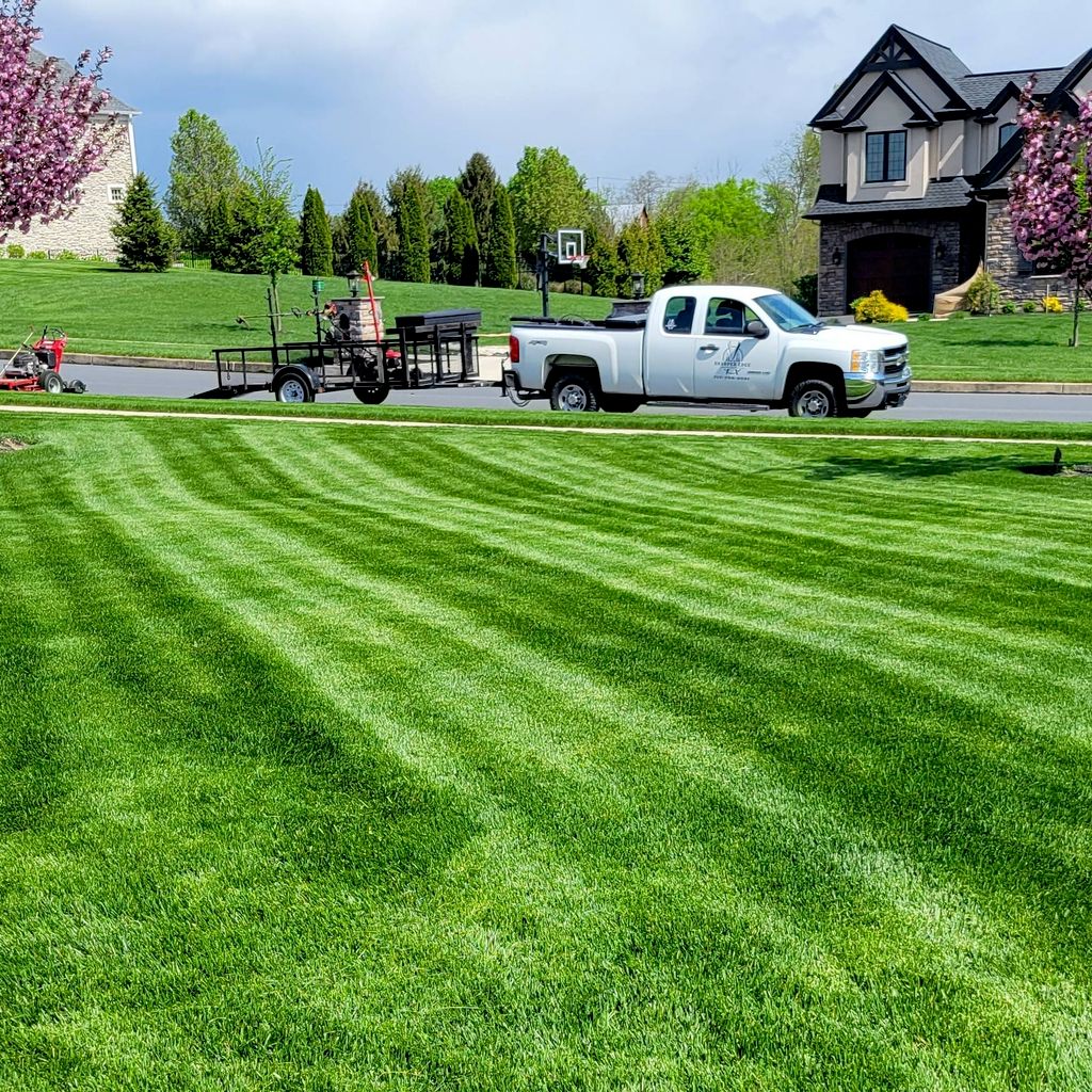 SHARPER EDGE LANDSCAPING