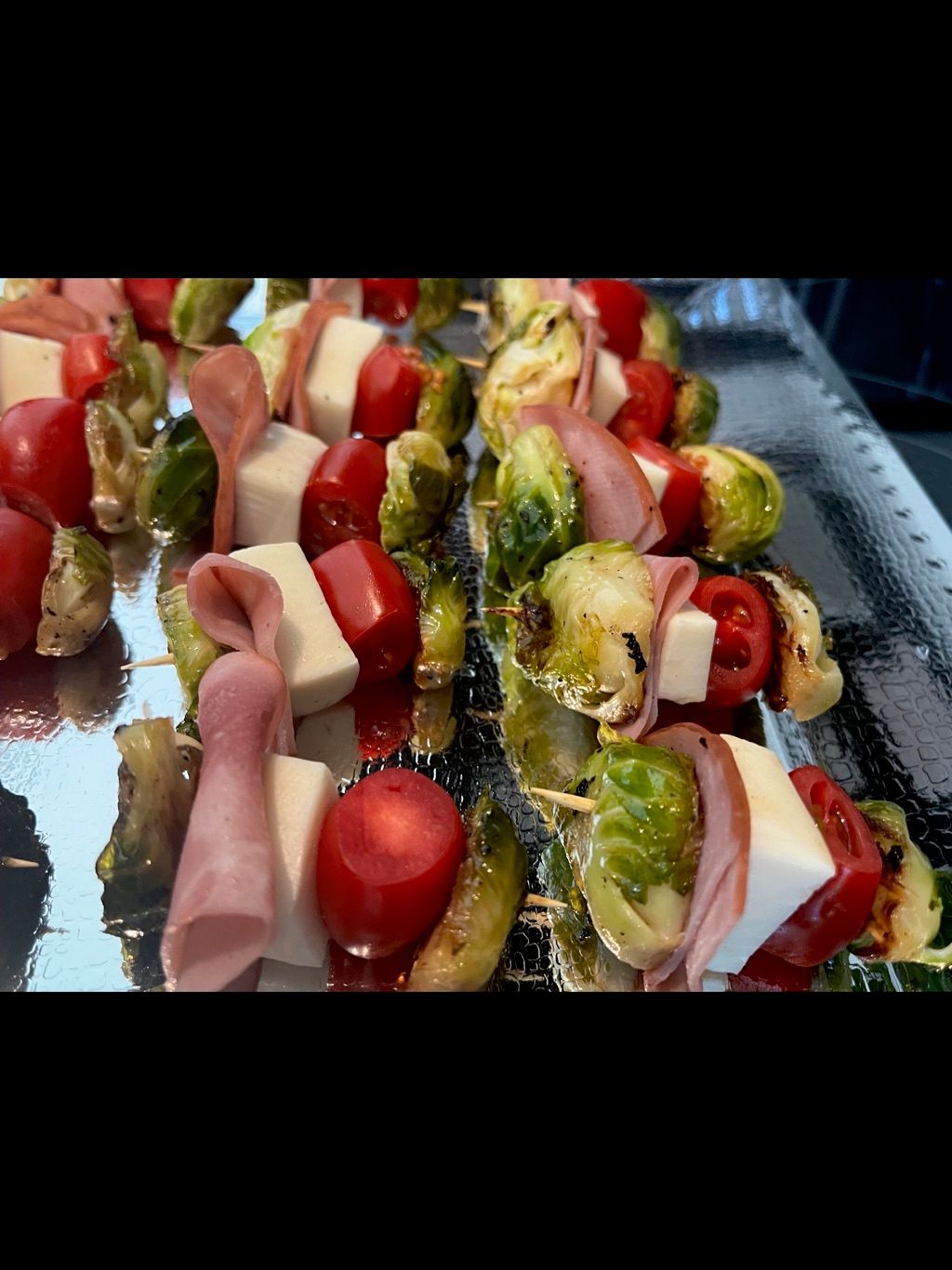 Brussel Sprout sliders w/mozzarella, cherry tomato