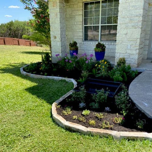 Limestone block flowerbed & planting homeowner’s s