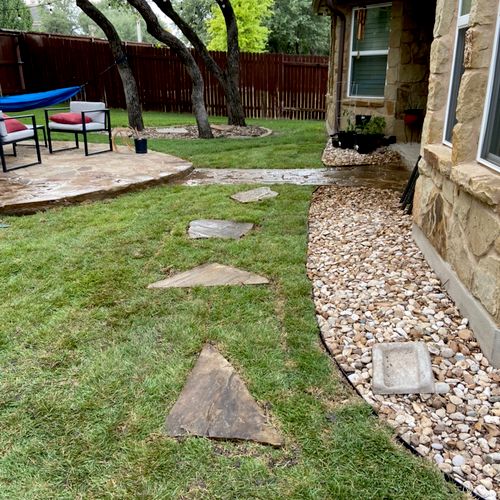 Backyard retrofit (gravel and sod).