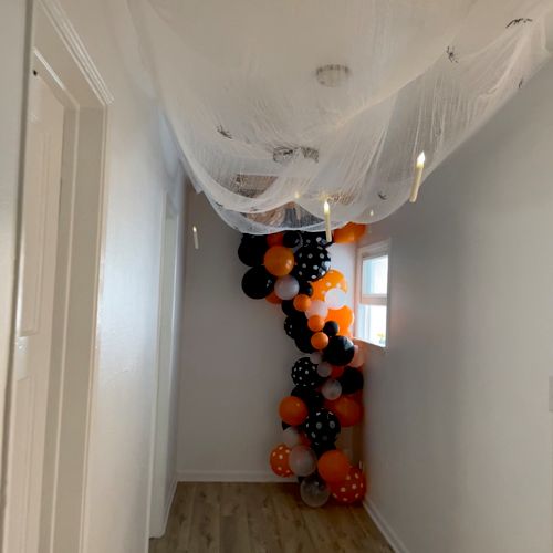 Murder mystery party balloon arch and spooky float