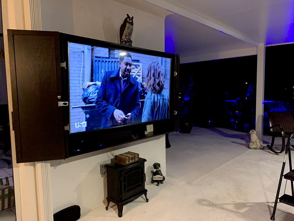 Custom-made TV cabinet. Both the TV and cabinet we