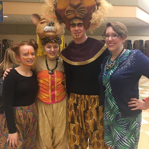 With students who performed in "The Lion King"