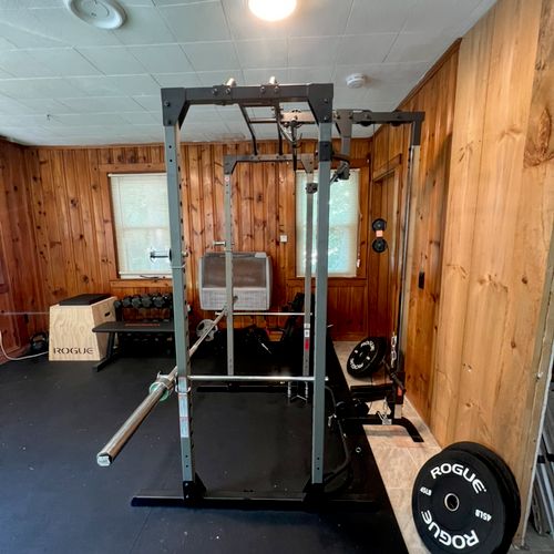 Squat rack and cable system 