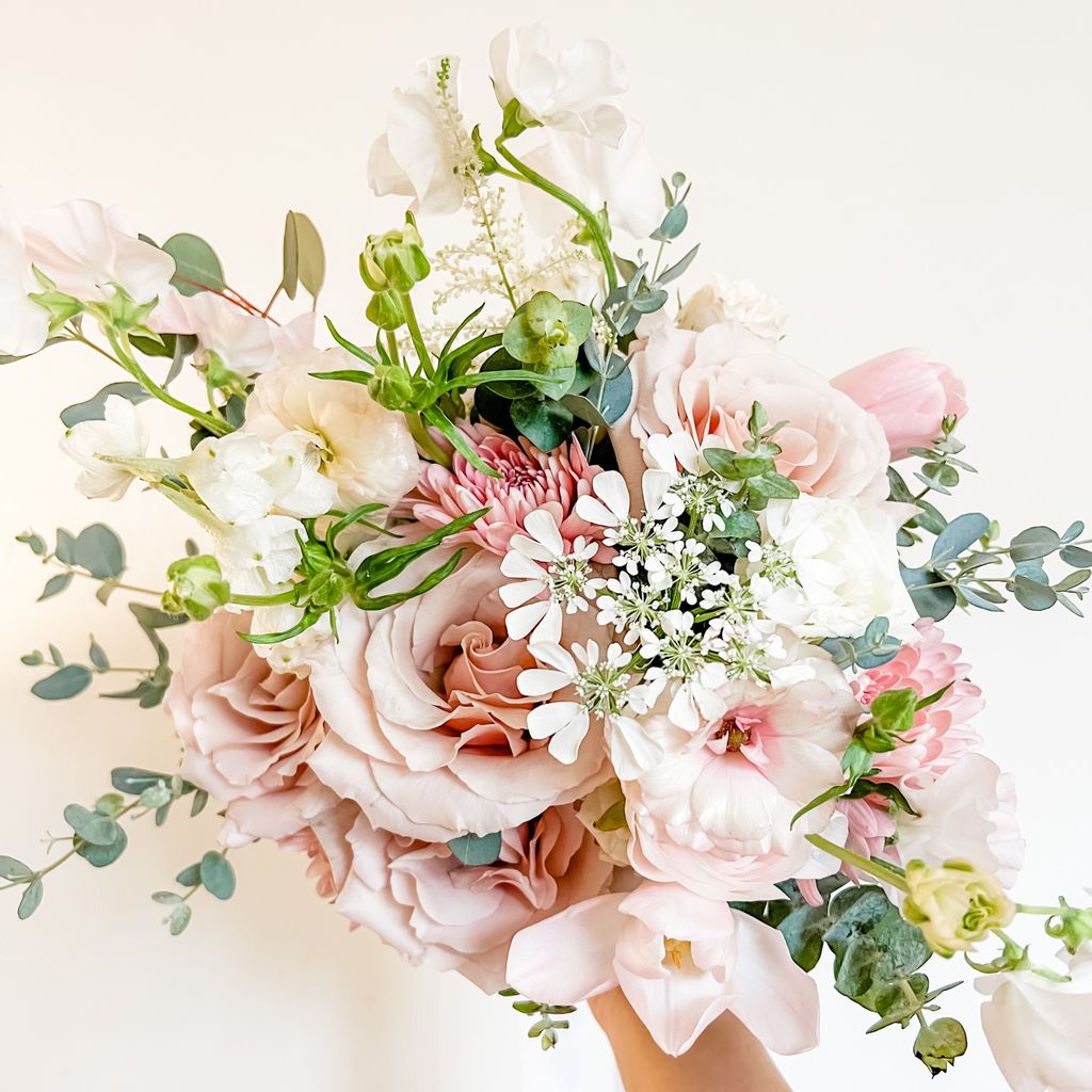 Sweet bridal bouquet in dusty and blush pinks, fea