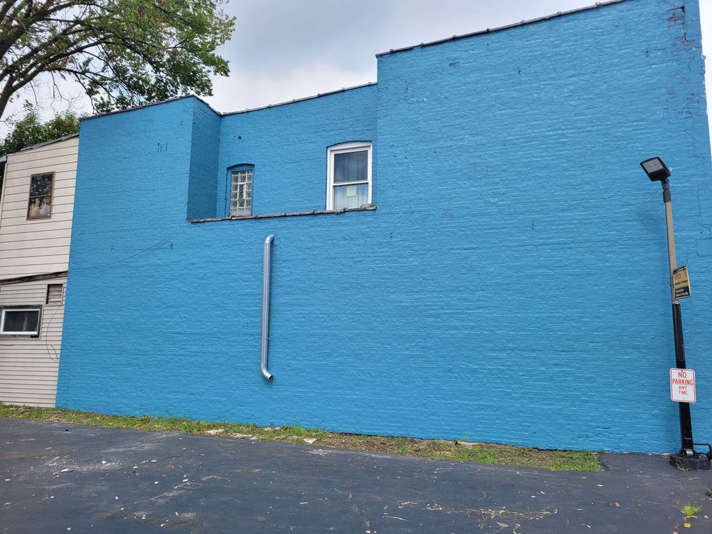 painted the wall this blue as a background for art