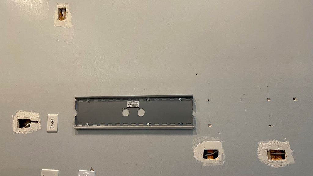 Drywall patching (before)