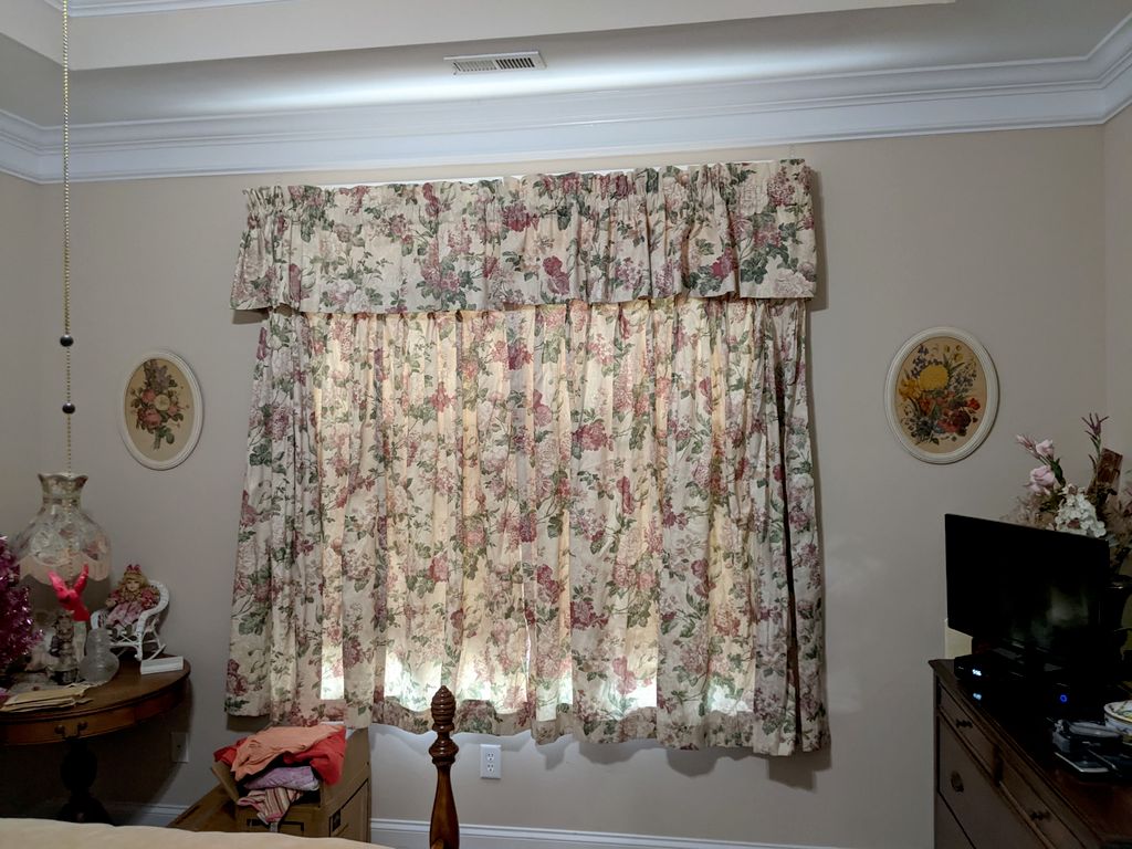 Valance on a rod and curtain on a sliding track