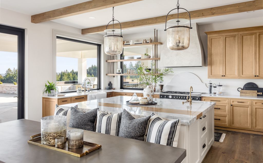 white and brown kitchen with wood cabinets to add warmth