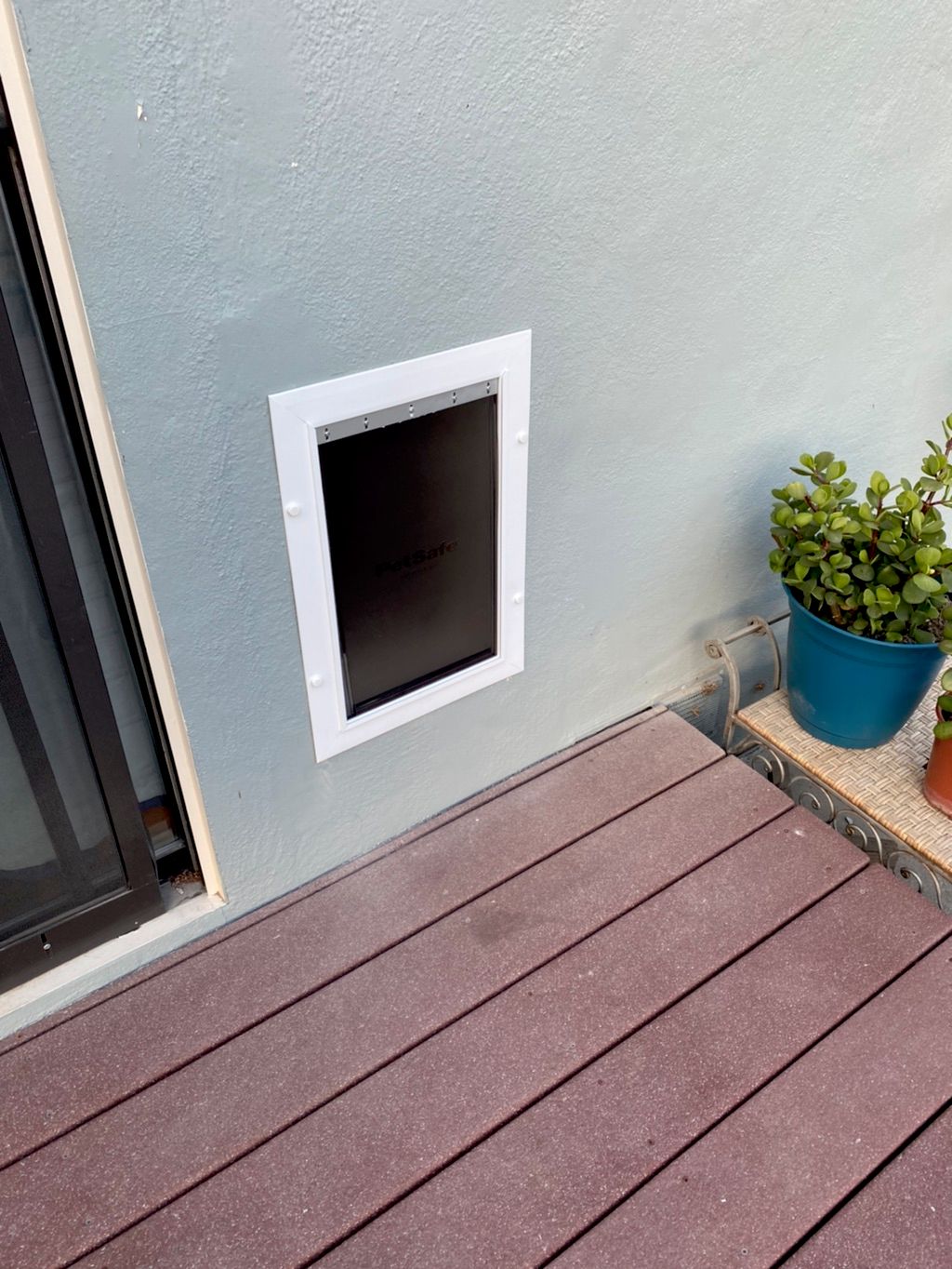 Professional installation of pet door even through
