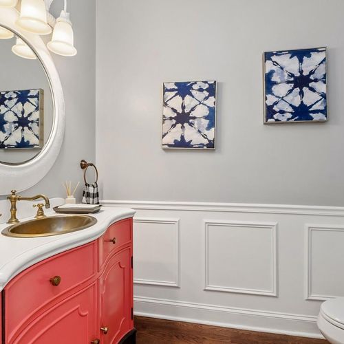 Painted vanity and added wainscot