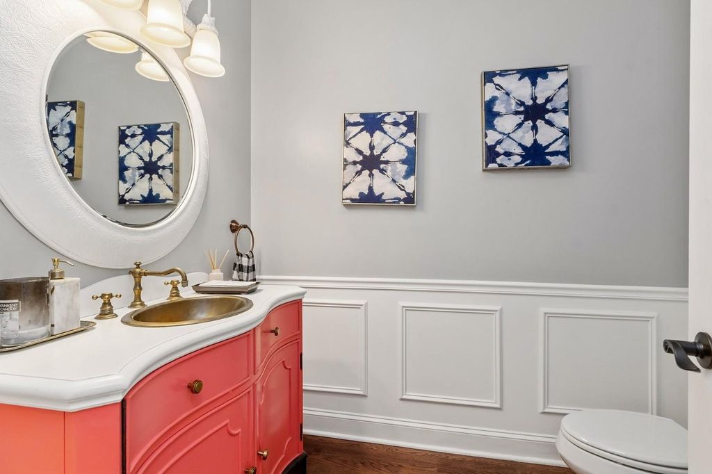 Painted vanity and added wainscot