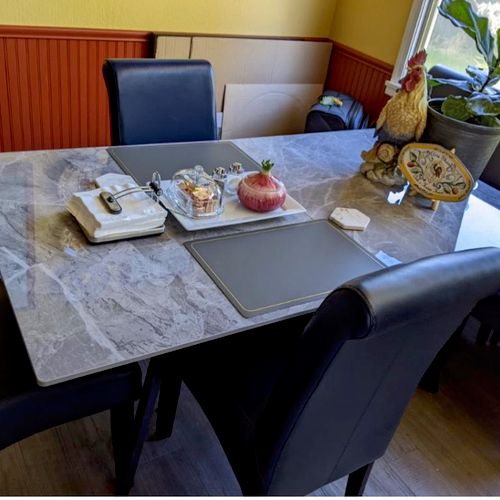 Marble top dining table moved from garage into din