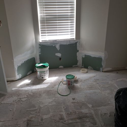 Unfinished Drywall & Vinyl Floor