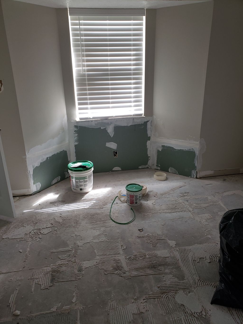 Unfinished Drywall & Vinyl Floor
