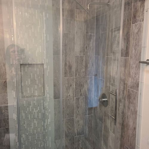 Andre did a great job installing a glass shower do