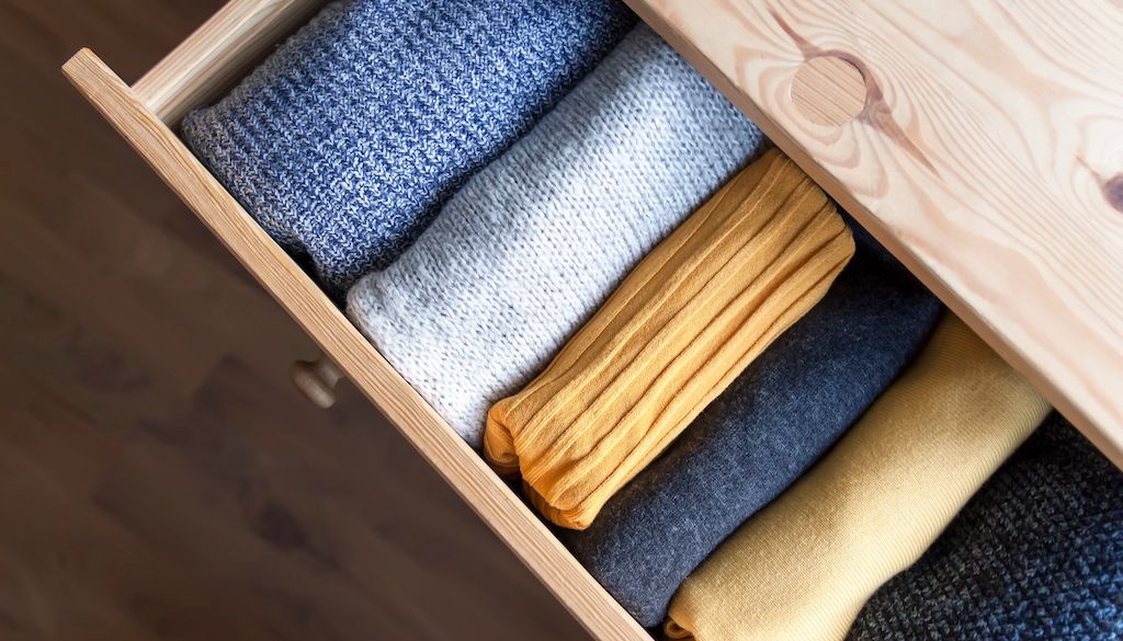 rolled clothes in drawer