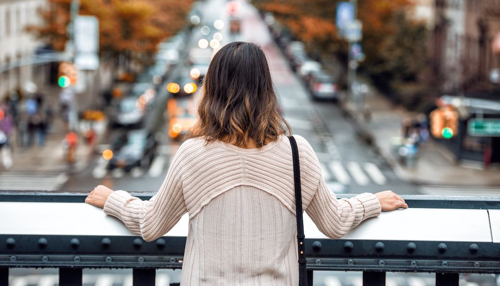 girl overlooking new city