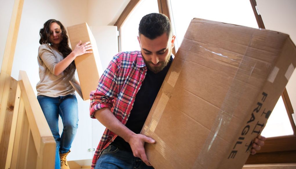 packing and moving items down the stairs 