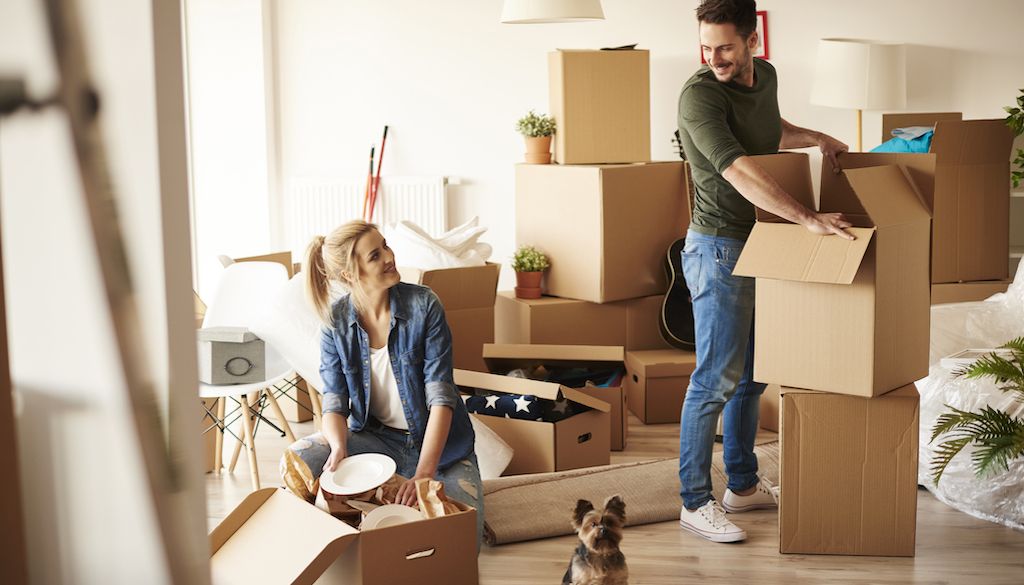 couple packing before a move