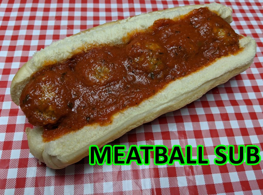 Italian style meatballs with herbed red sauce on a