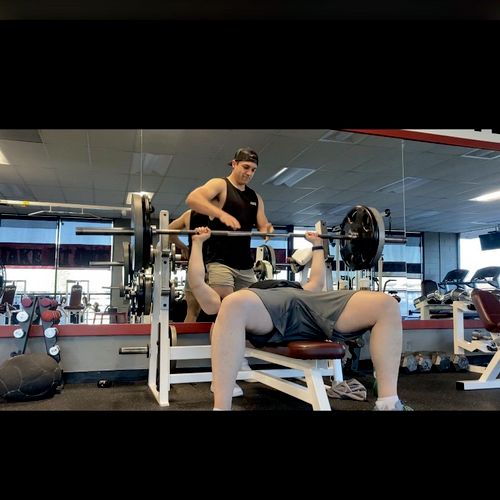 Client Brian hitting 225 on bench for the first ti
