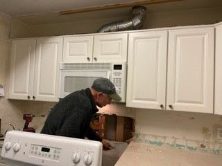 Repairing drywall.