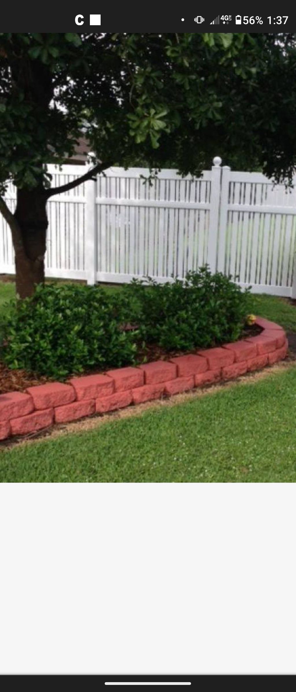 finished fence and retaining wall landscape bed. 