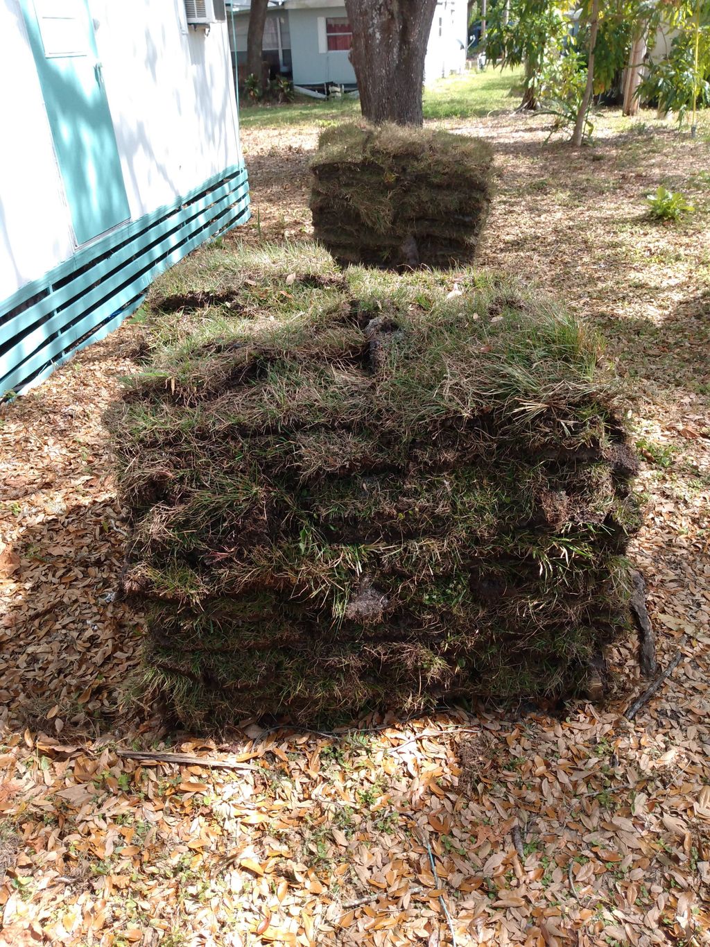 Handyman work, pallets of sod