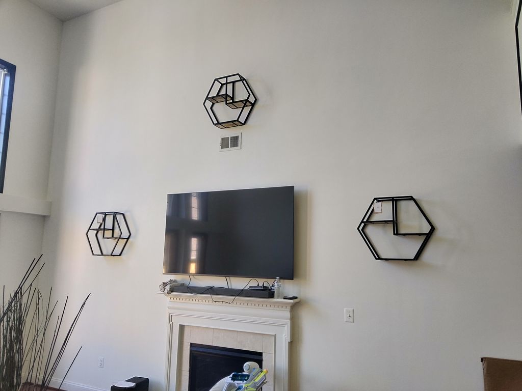 Hanging display shelves and t.v's