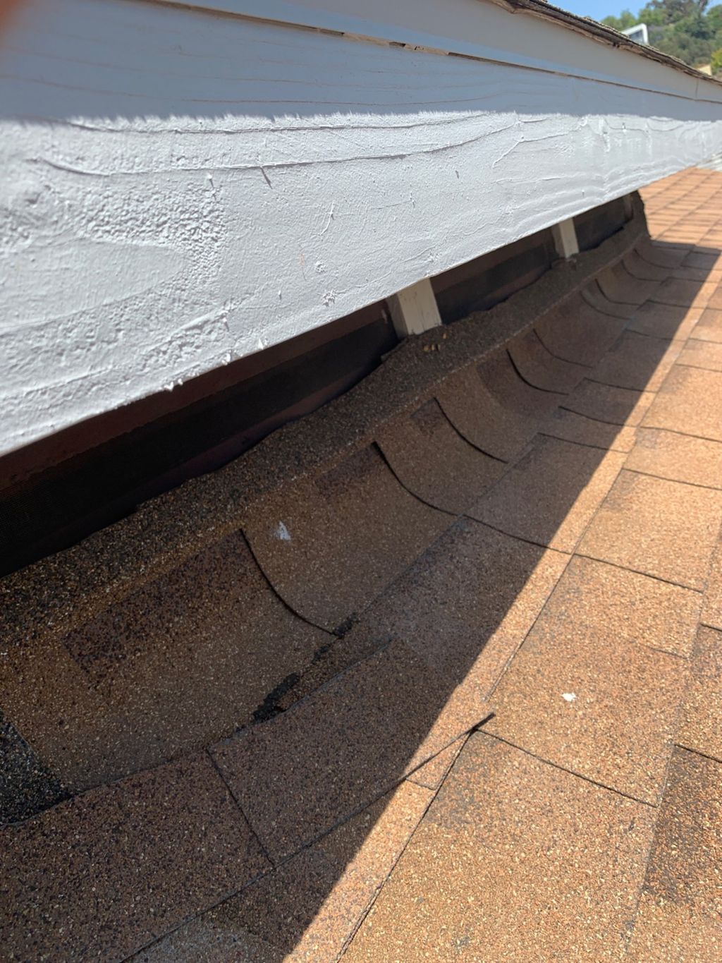 Shingles that touch siding material can cause rot.