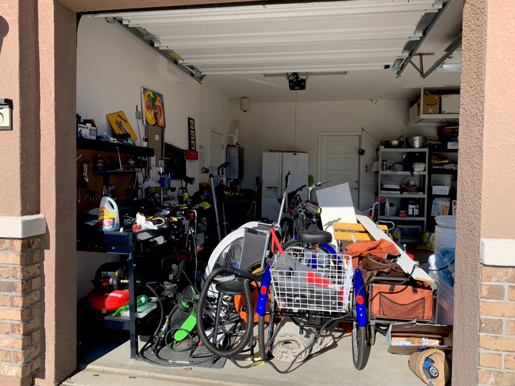 Side garage clean up before.