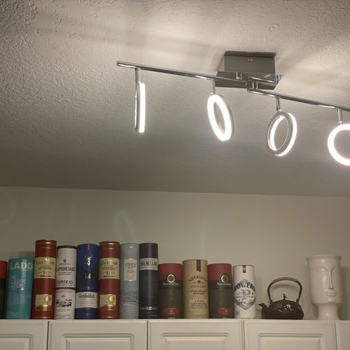 Garik installed a lighting fixture in the kitchen 