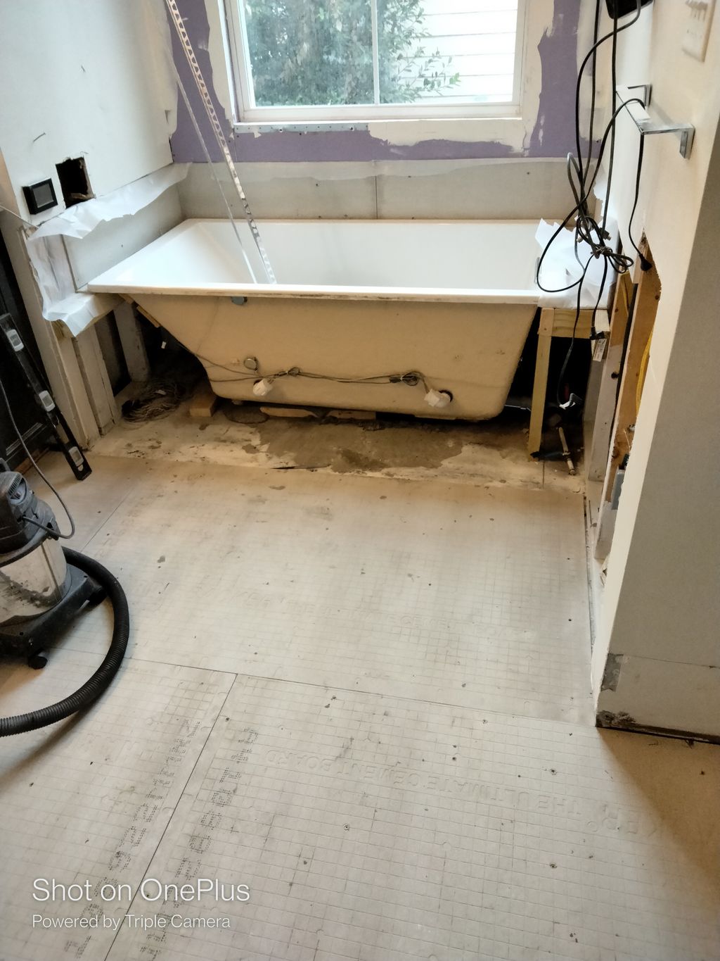 Water damage renovation of master bathroom. Mid st
