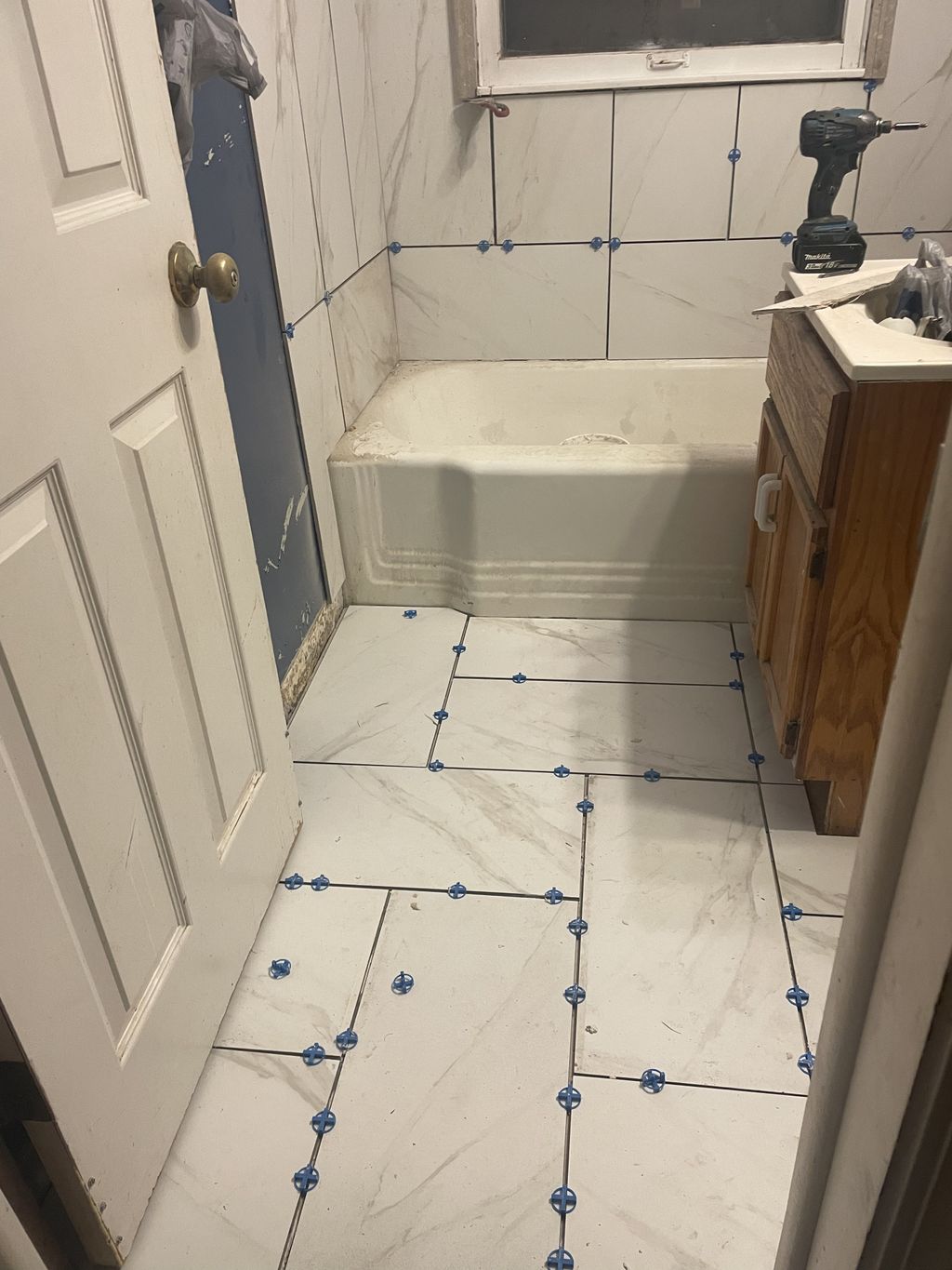 Tile bathroom floor/walls