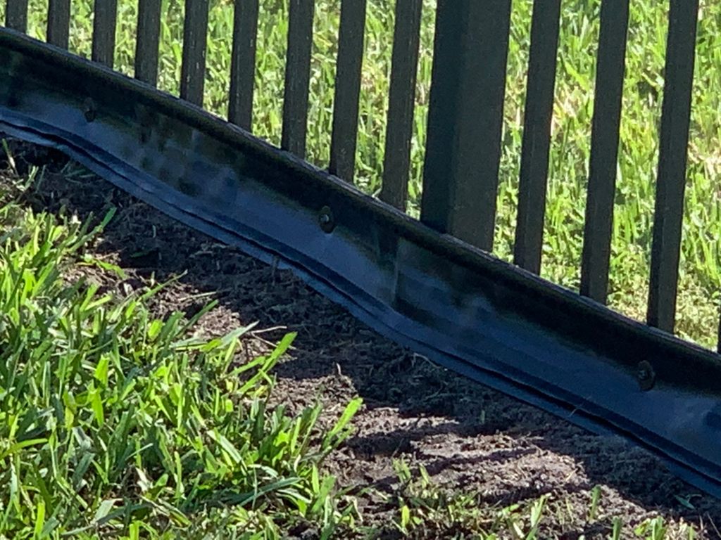 Critter Fence - bottom plastic edging against weed