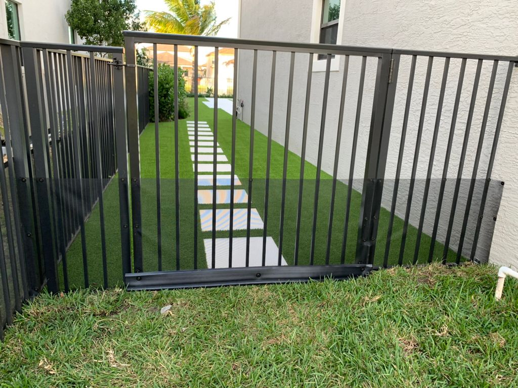 Critter Fence front gate with plastic edging 