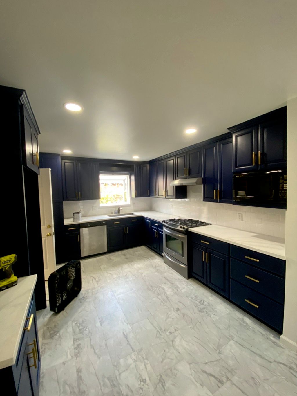 Full cabinet paint job from wood to royal blue fin